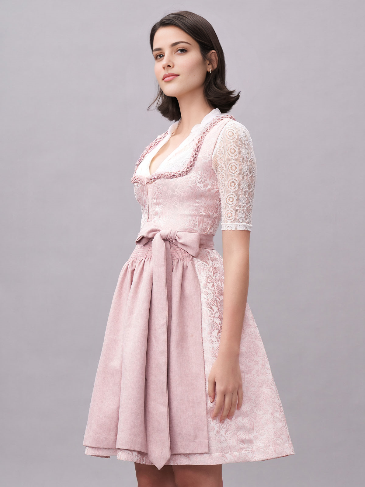Dirndl in Rosa mit grünen Akzenten